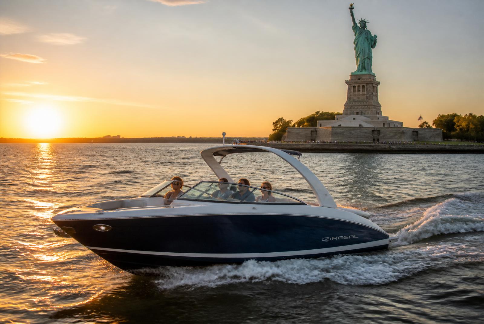 Regal LX6 cruising past the Statue of Liberty